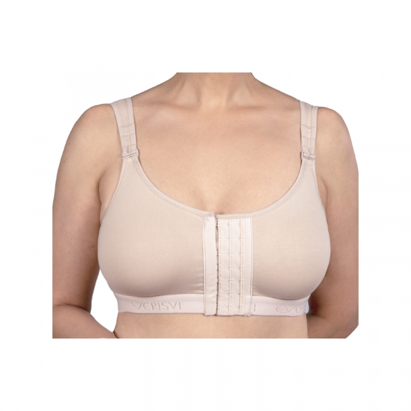 Sujetador Mamoplastia Compresivo con corchetes Crisvi de algodón y lycra. Copa preformada (sin costuras) montada sobre un cuerpo que cubre la espalda a modo camiseta. Cómodos tirantes regulables. Triple fila de corchetes delantera. Bolsillo que permite la colocación de una prótesis externa. Marca: Crisvi